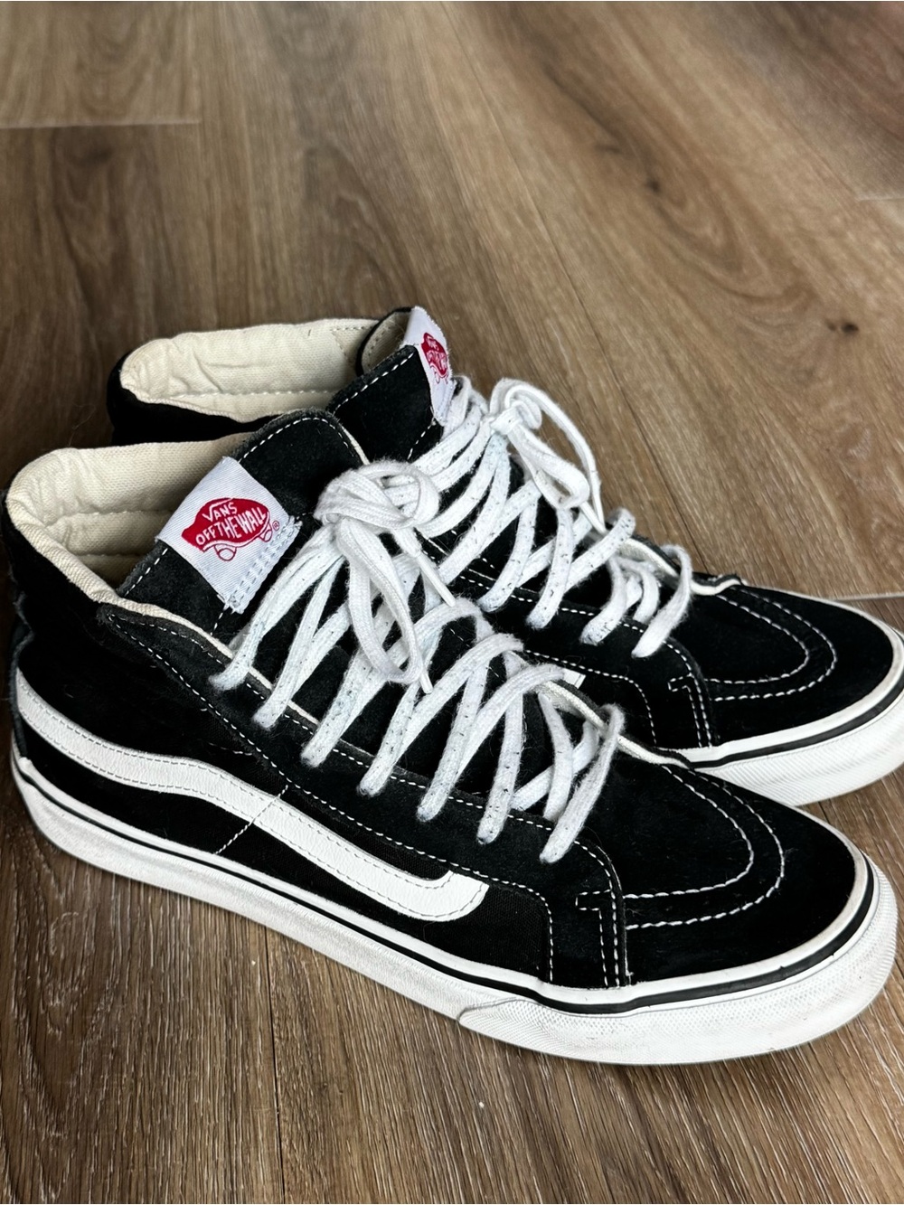 Vans Black and White High-Top Skate Sneakers